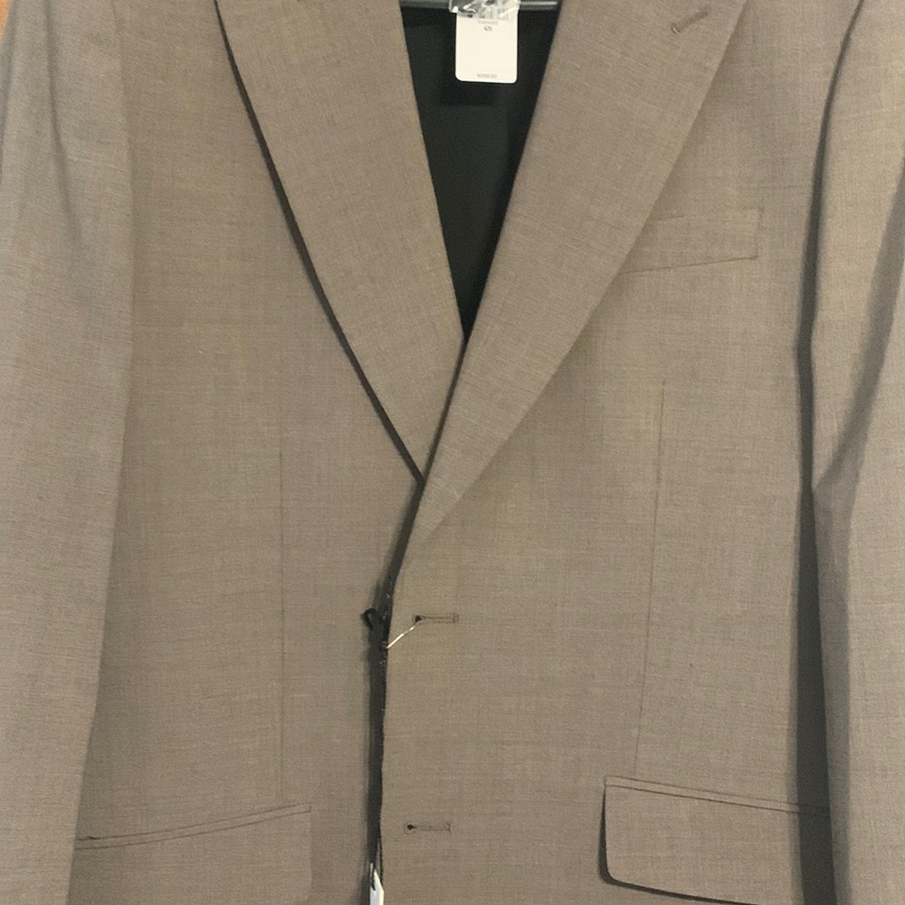 Never worn blazer from express tags still attached a grey brown color